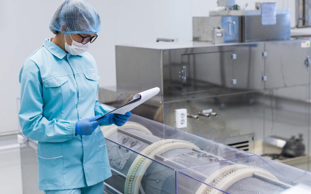 Technician checking equipment in a medical irradiation sterilization lab.